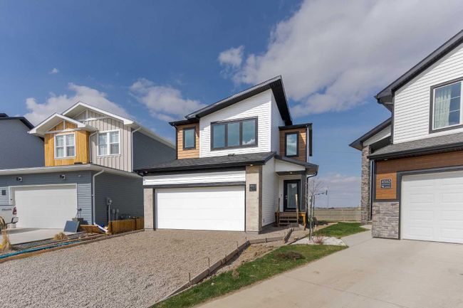 4561 25 Avenue S, Home with 3 bedrooms, 2 bathrooms and 4 parking in Lethbridge AB | Image 1