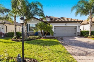 19224 Elston Way, House other with 4 bedrooms, 3 bathrooms and null parking in Estero FL | Image 1