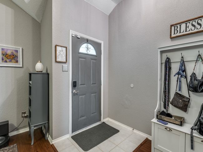 Foyer entrance with baseboards and wood finished floors | Image 5