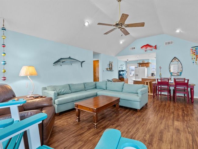 Step into the Family Room open to dining and kitchen. | Image 4