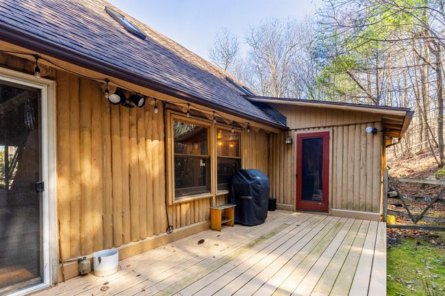 Wooden terrace with grilling area and fence | Image 8