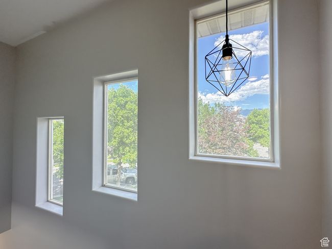 Interior details featuring a chandelier | Image 8