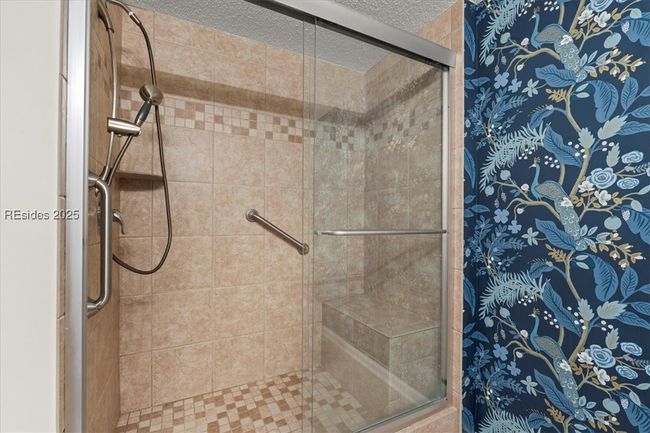 Guest suite generous shower. | Image 28