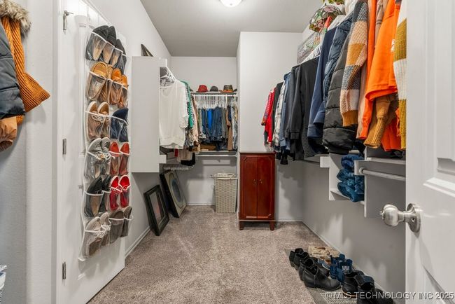 One of 2 primary bedroom walk in closets | Image 37