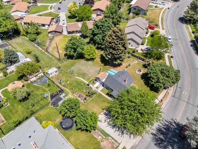Aerial view of property's location with nearby suburban area | Image 25