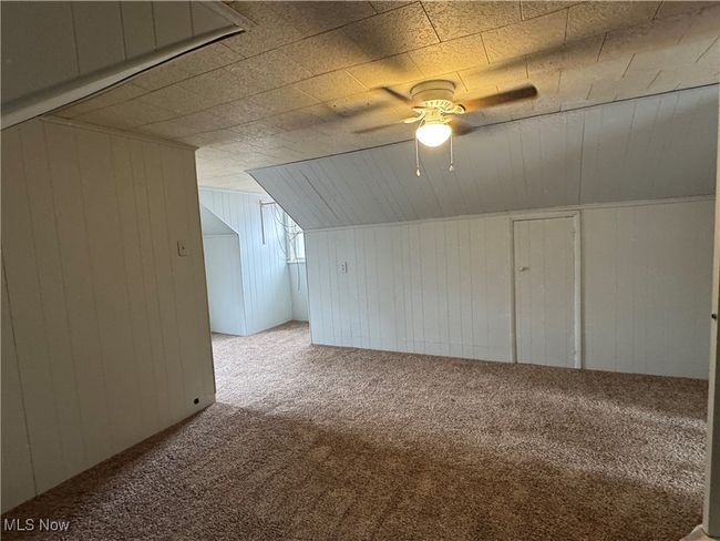 Bonus room featuring light colored carpet and ceiling fan | Image 19
