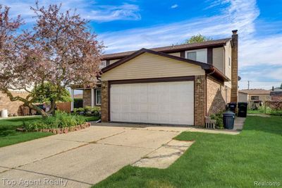 4664 Lucerne Drive, Home with 4 bedrooms, 2 bathrooms and null parking in Sterling Heights MI | Image 1