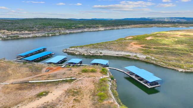 Marina on site. Boat slips purchased separately. Lakefront living at its best! | Image 26