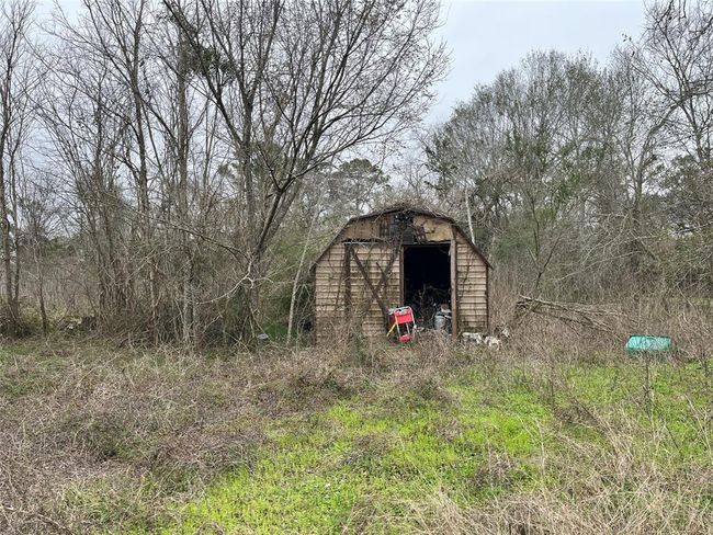 This is near the end of your driveway. The house is to the left. | Image 18