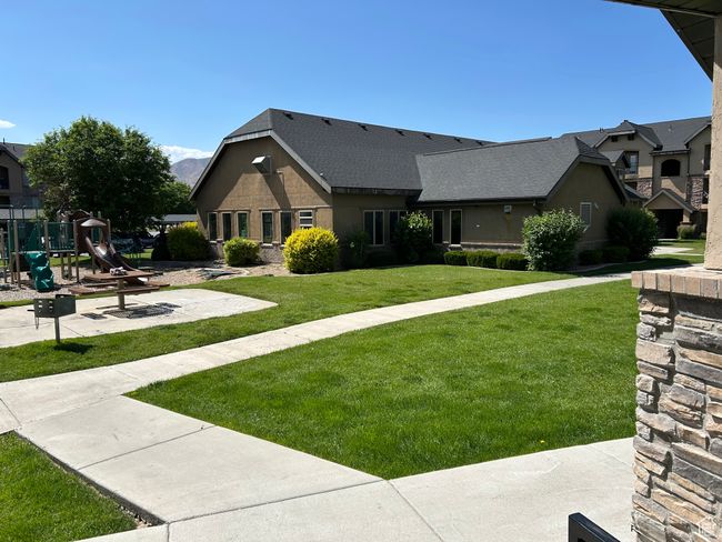 View of front of house featuring a playground and a front lawn | Image 7