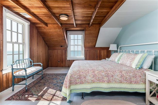 Primary bedroom with beautiful water views. | Image 16