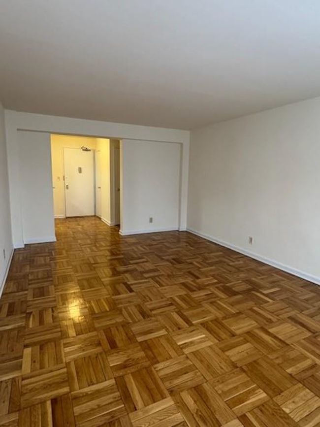 Spare room with baseboards | Image 7