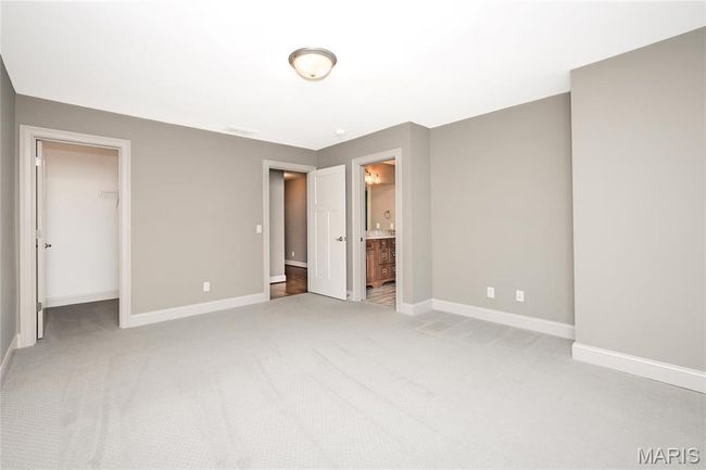 Upstairs bedroom with a walk-in closet | Image 35