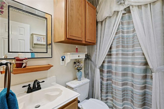 Pristine second bathroom with skylight, bringing in soft natural light throughout the day. Clean, well-maintained, and move-in ready. | Image 19