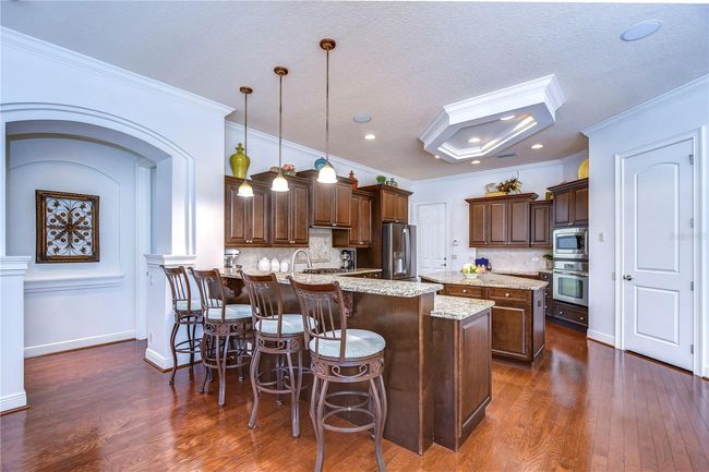 Welcome to the heart of this stunning home. | Image 10