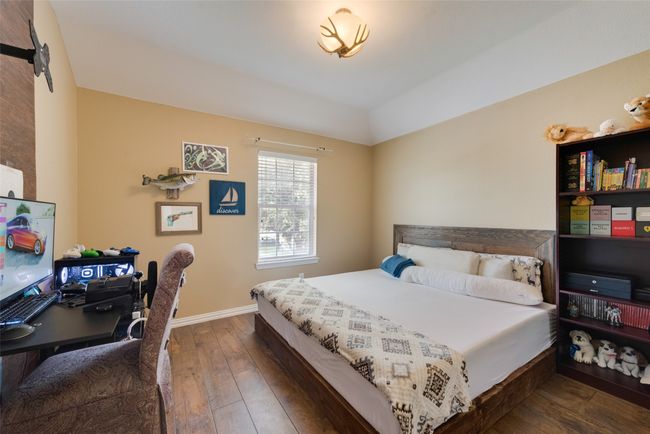 4th upstairs bedroom featuring wood-style flooring and baseboards | Image 27