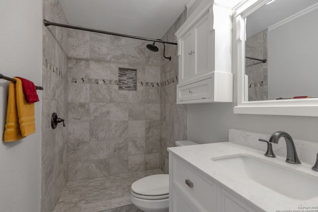 Primary bathroom with a walk-in, tiled shower | Image 19