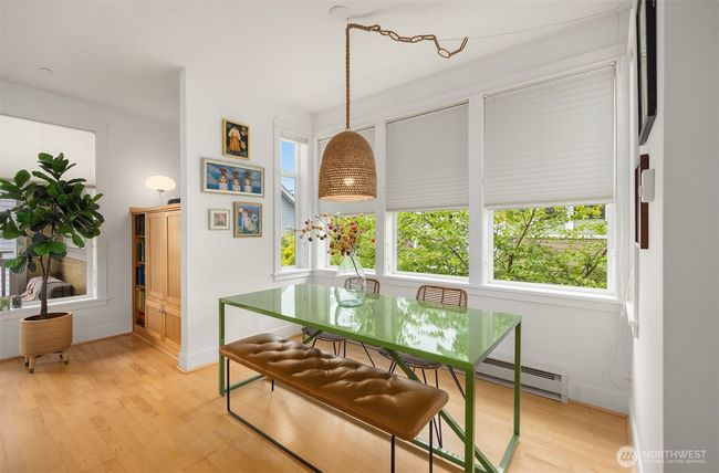 Set in an alcove which expands the space, the dining nook! | Image 7