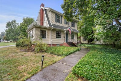 View of front facade with a front yard | Image 1