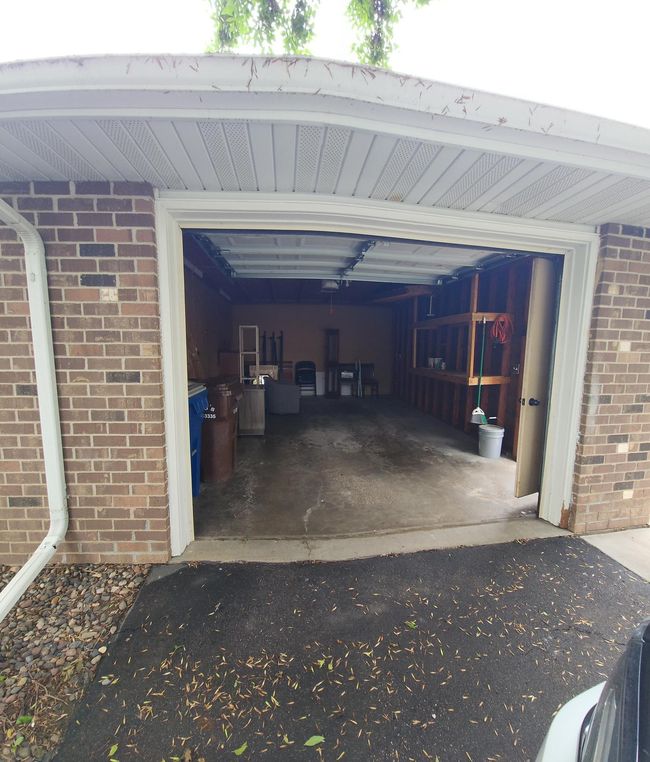 Garage stall. Driveway is parking for guests. Also has street parking. | Image 7