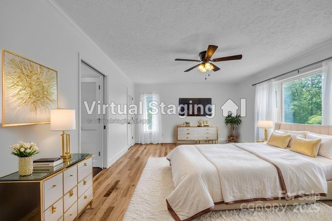 Virtual staged primary bedroom | Image 21