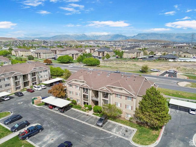 Aerial view of residential area featuring a mountain backdrop | Image 26
