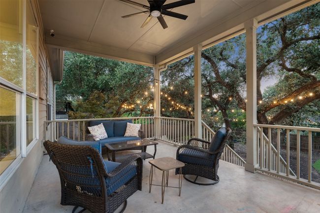 hangout area and ceiling fan | Image 32