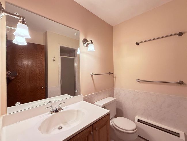 Owner's suite has its own 3/4 bath. | Image 16