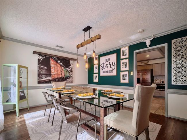 The Dining Room is located just off the kitchen and front entry. | Image 14
