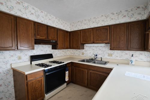 1033 Kelsey Ave, Lansing, MI, 48910-2771 | Card Image