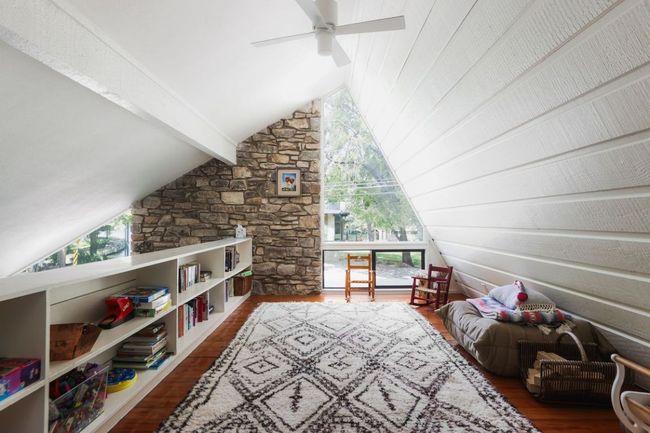 Recreation room with lofted ceiling with beams, ceiling fan, and dark wood-type flooring | Image 27