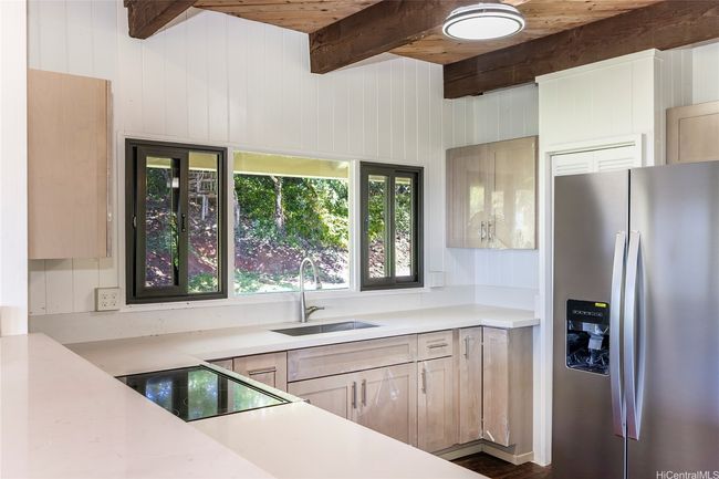 Kitchen with new cabinets, appliances and countertops | Image 5