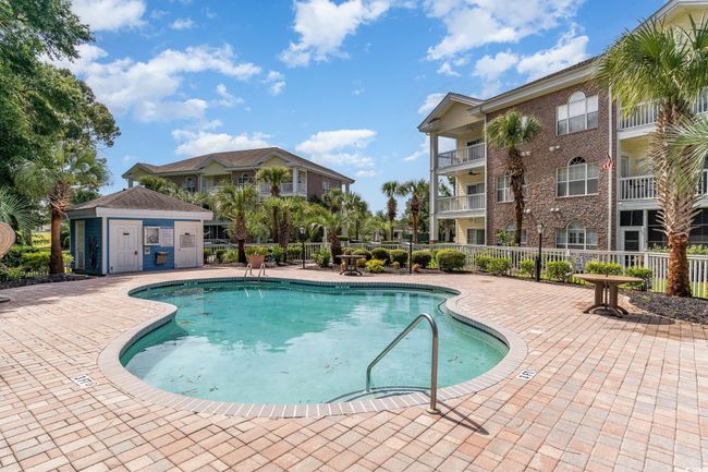 View of pool featuring a patio area | Image 20
