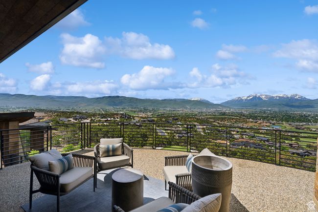 View of patio / terrace featuring a mountain view and a balcony | Image 107