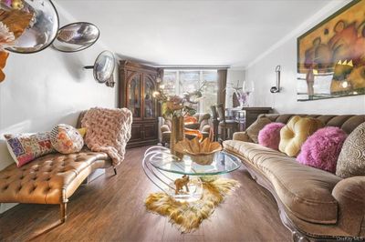 Living room with crown molding and hardwood / wood-style flooring | Image 3