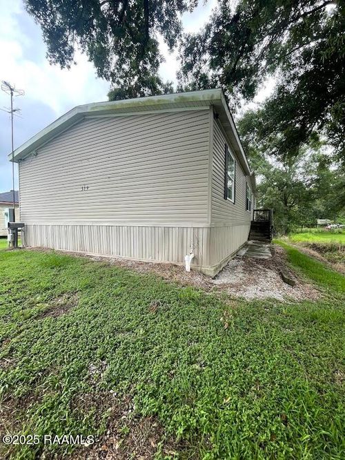 319 E Lovell St, Crowley, LA, 70526-6827 | Card Image