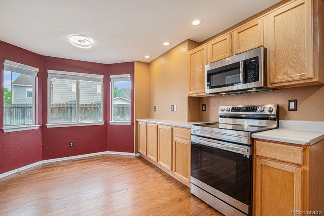 11722 Oakland St, House other with 4 bedrooms, 3 bathrooms and 2 parking in Henderson CO | Image 7