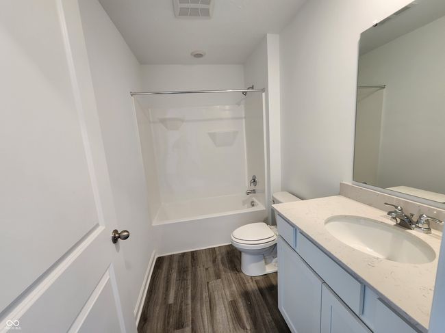 empty room featuring visible vents, baseboards, and carpet floors | Image 9