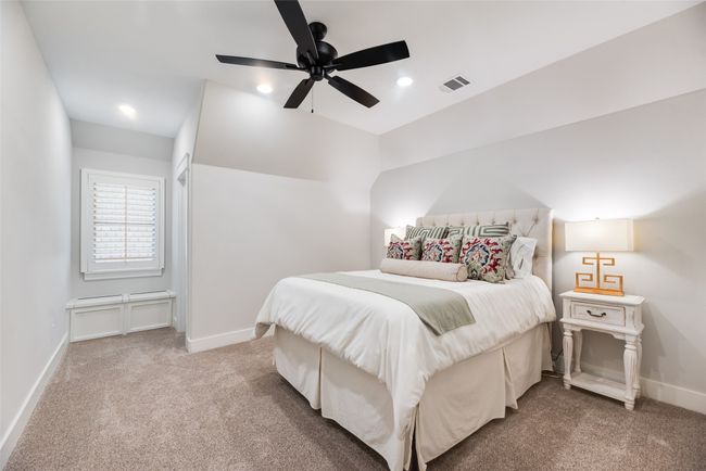 Carpeted bedroom with baseboards, ceiling fan, and recessed lighting | Image 33