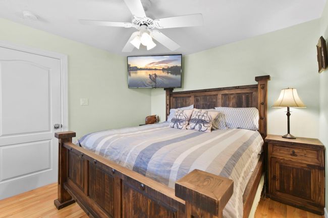 The third bedroom features a spacious office area and a generous closet. | Image 35