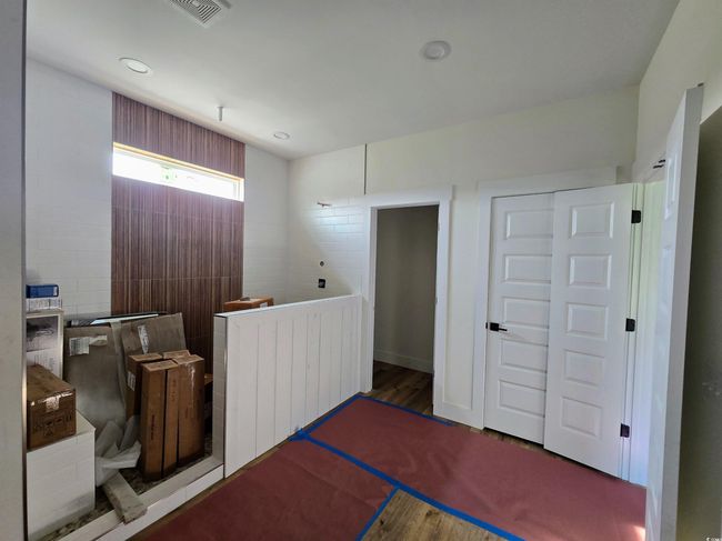 Interior space with wood finished floors | Image 24