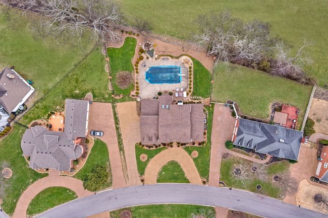 Beautiful lawn and lot! Sellers have a lawn care service--check out how green their grass is even in February! | Image 49