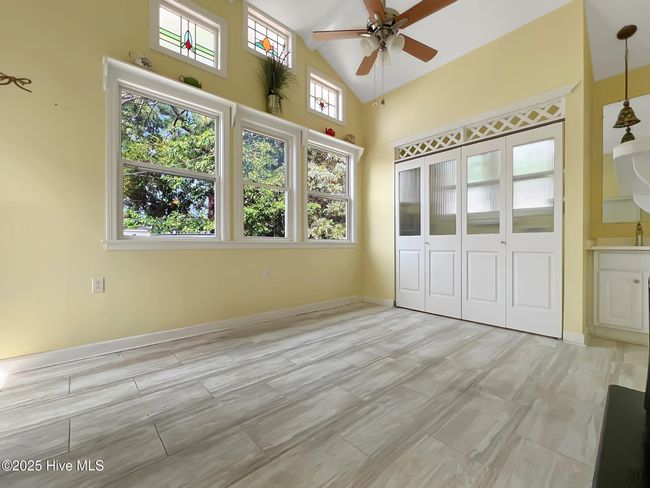 Sunroom with tall ceilings | Image 13