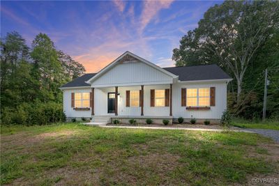 View of front of property featuring a yard and a porch | Image 2