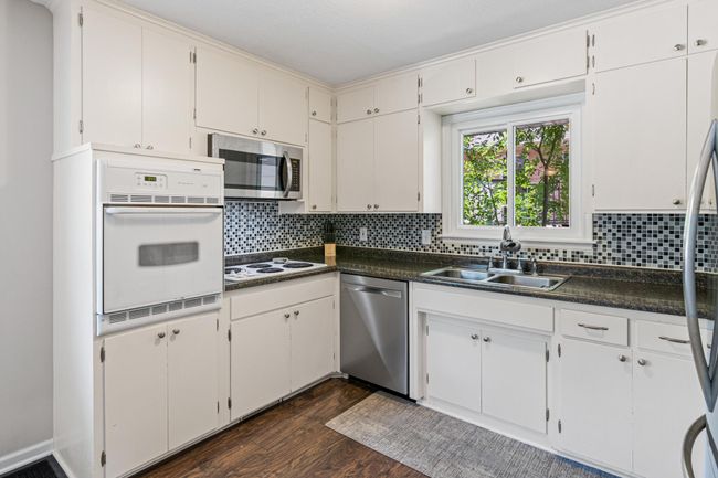 Great storage space in this sun-filled kitchen! | Image 8