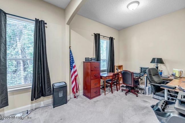 Backside of bedroom 6 (Theater Room). Great space for exercise, office, kids toys, etc. | Image 18