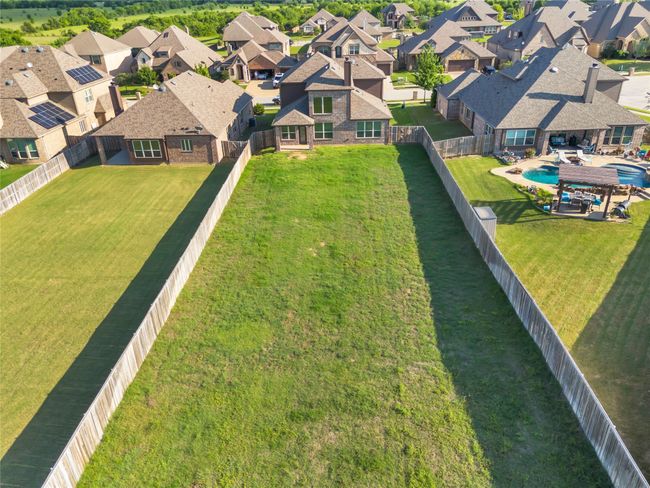 Aerial perspective of suburban area featuring a pool | Image 29