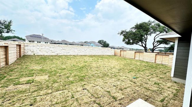 View of yard with a residential view and a fenced backyard | Image 24