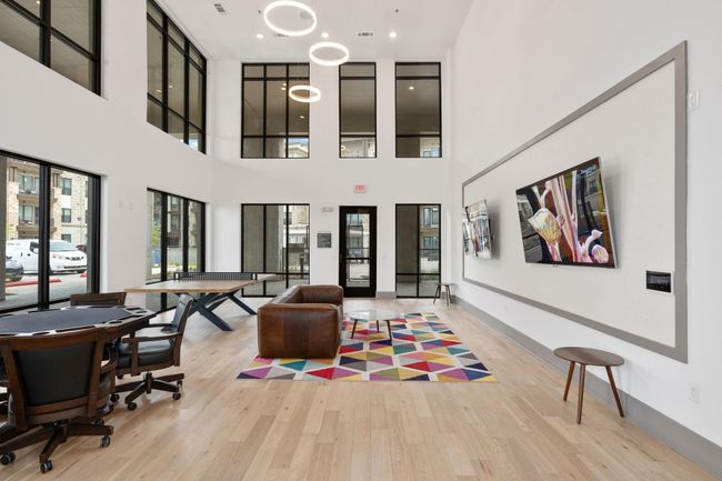 Community lobby featuring a towering ceiling and recessed lighting | Image 28