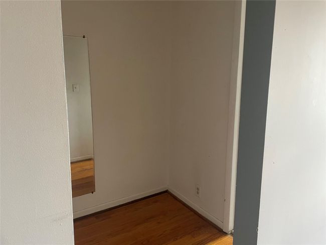 dressing area outside of bathroom | Image 12